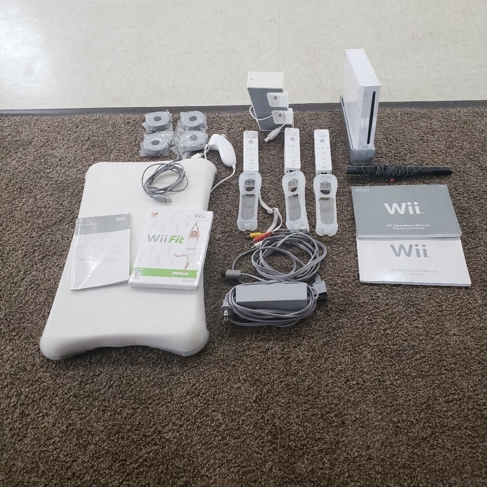 Wii Console with Balance Board and Wii Fit game.